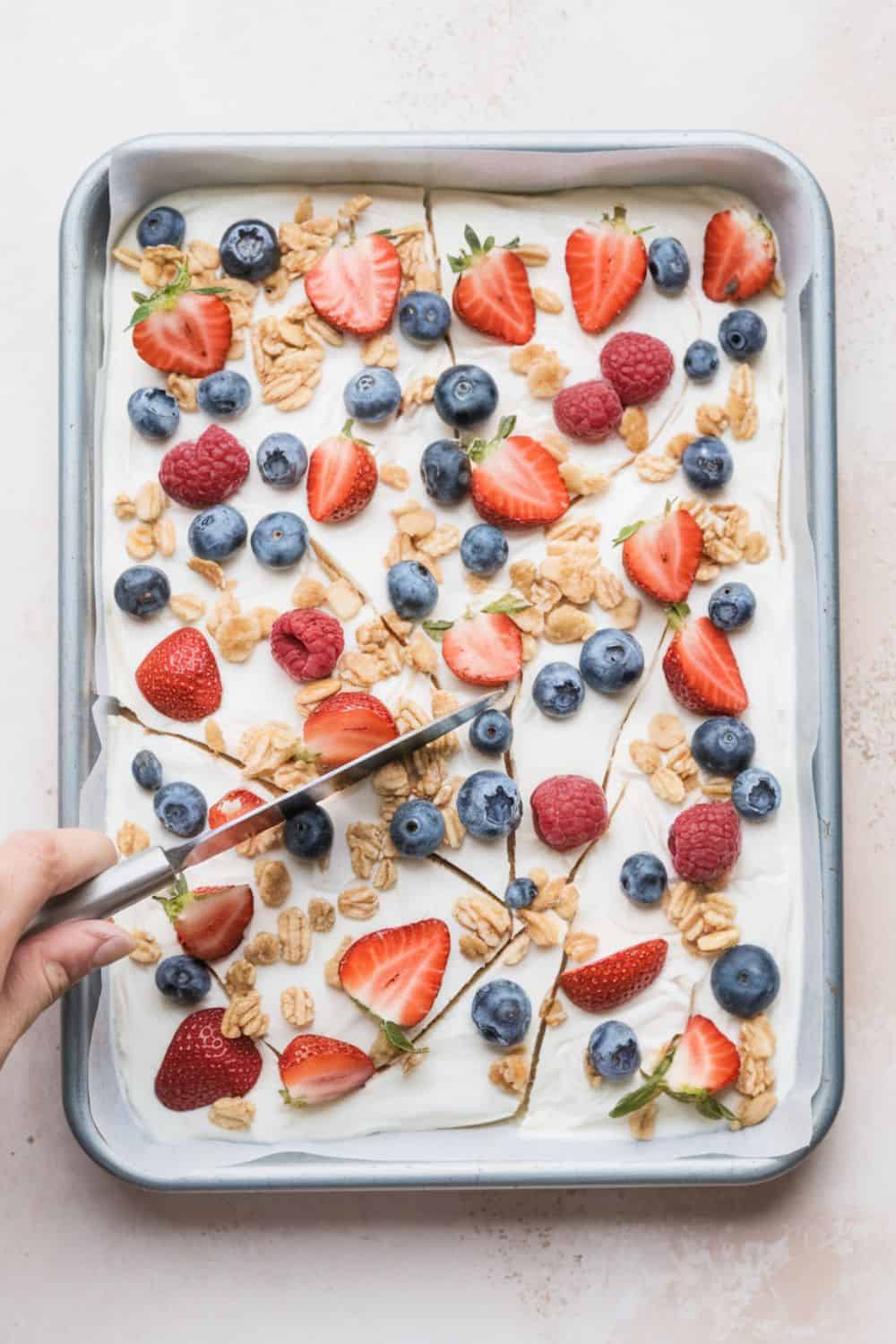 Frozen Yogurt Bark with Fruits and Nuts on a baking tray