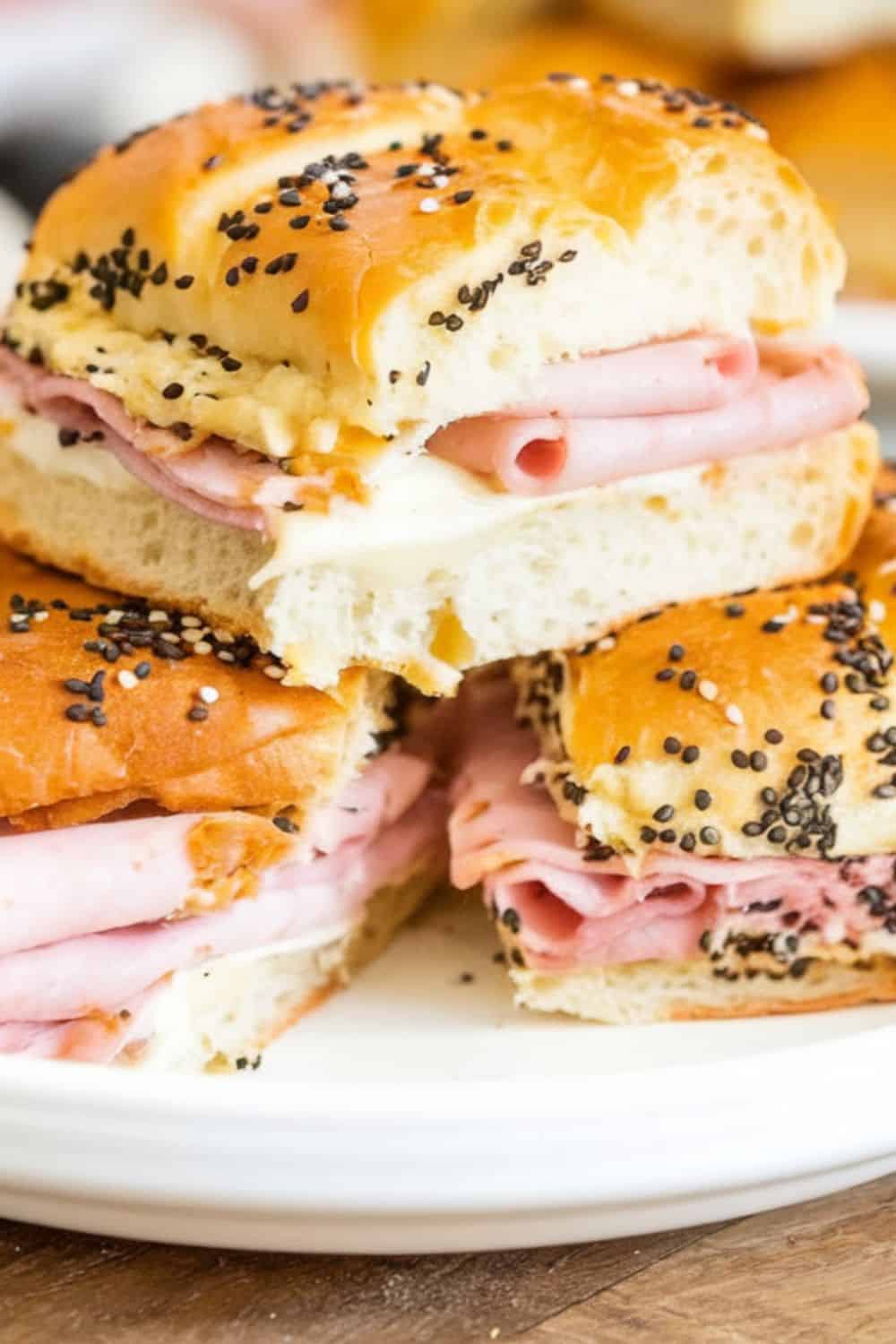 Ham and Cheese Breakfast Sliders stacked on a plate