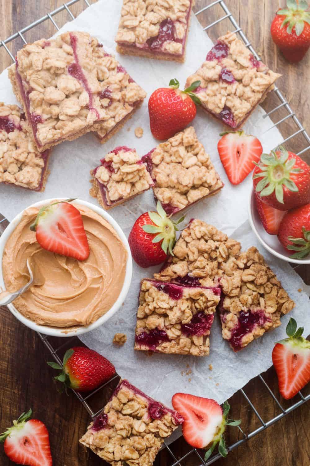 Peanut Butter and Jelly Breakfast Bars arranged on a wire rack