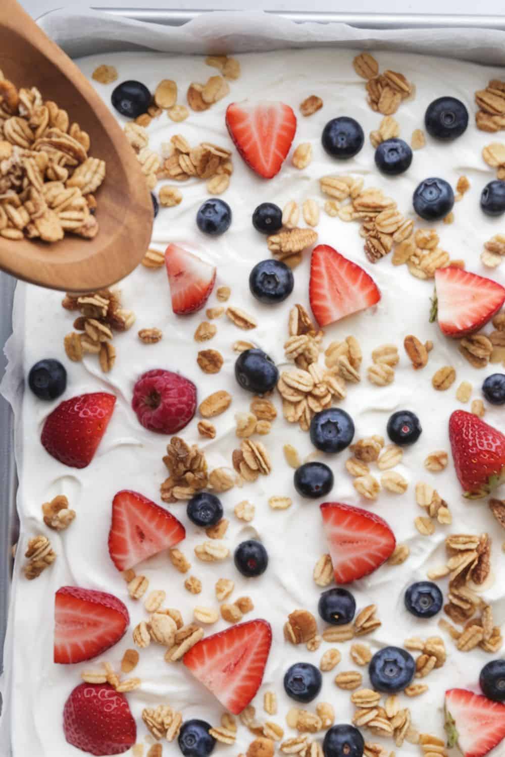 a-photo-of-a-rectangular-baking-tray-of Frozen Yogurt Bark with Fruits and Nuts