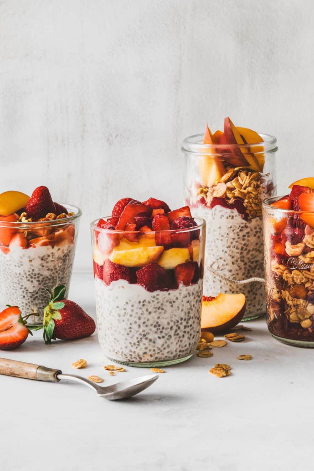 a-photo-of-three-glass-jars-filled-with-overnight refrigerator oatmeal