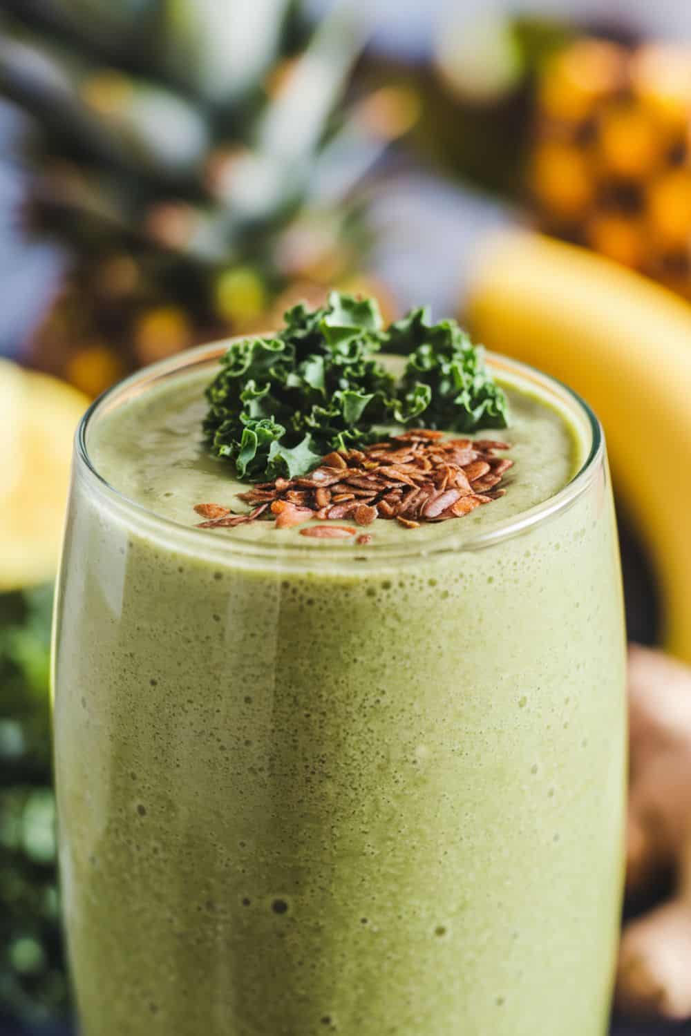 glass filled with Green Smoothie with Kale and Pineapple