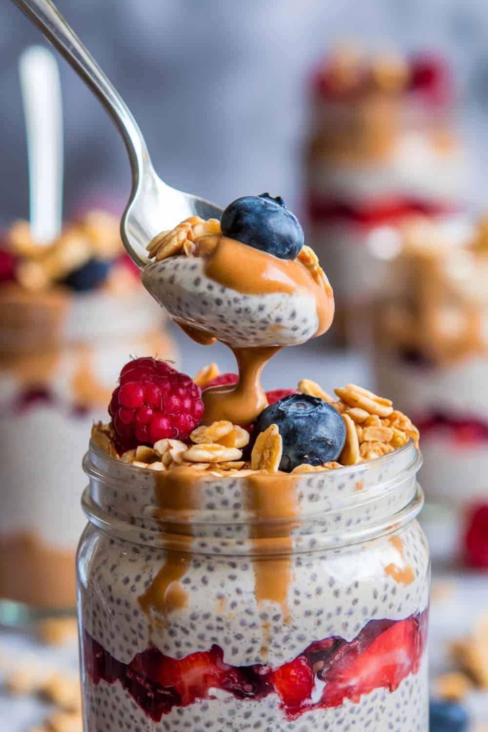 spoon-dipping-into-Almond Butter and Chia Seed Parfait